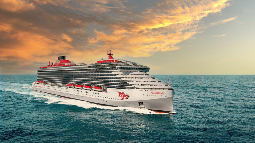 The Virgin Voyages Valiant Lady sails into the horizon, a striking vision of modern luxury at sea.