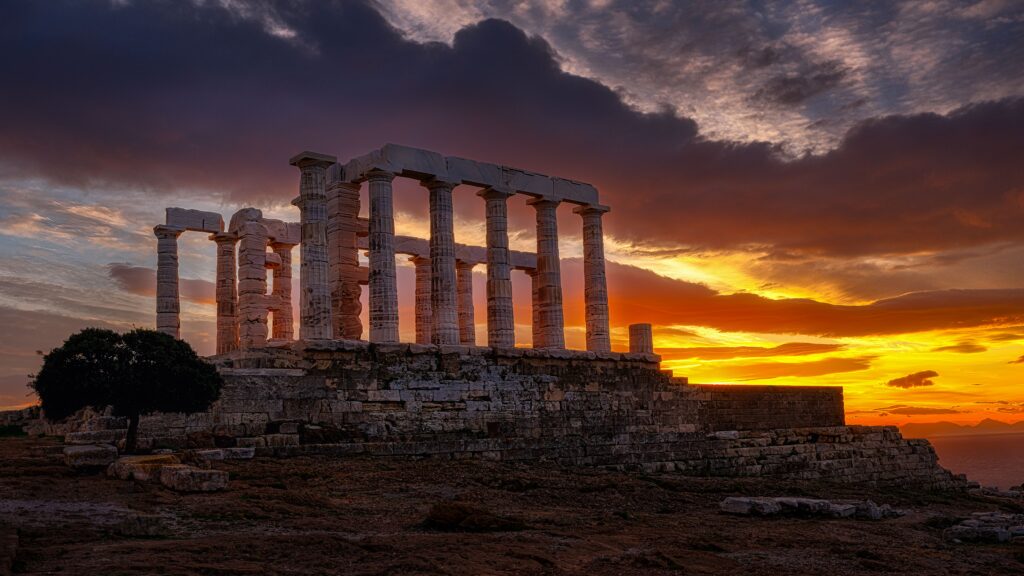 Temple of Poseidon at Cape Sounion, Greece, during sunset